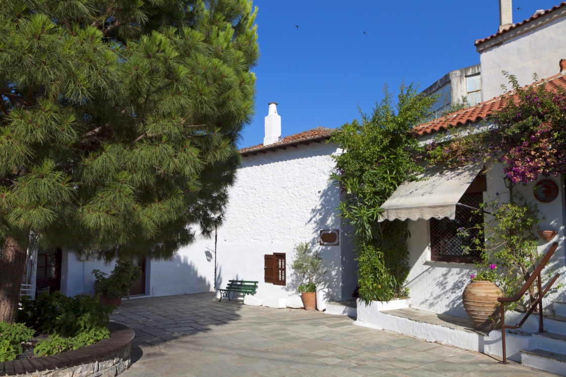 Traditional streets and houses at Skiathos island in Greece. Specific house used to belong to Papadiamantis famous Greek writer.